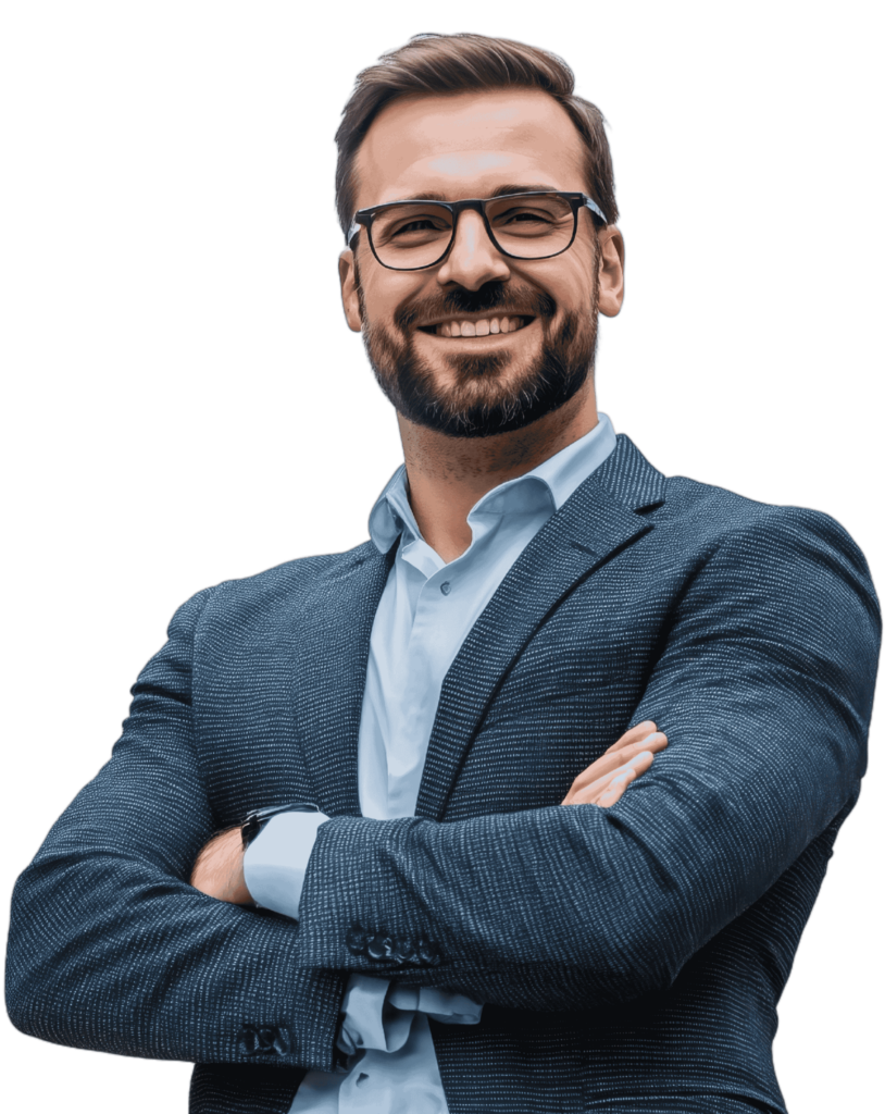Male owner-operatory staffing franchise owner, standing confidently with arms crossed.